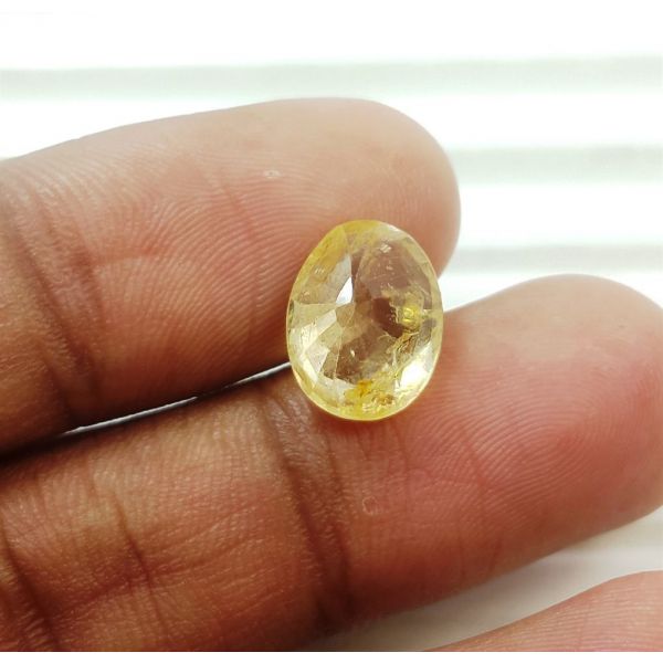 8.84 Carats Natural Oringish Yellow Sapphire 11.25x8.75x5.46mm