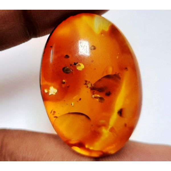 25.91 Carats Natural Orangish Red Amber 34.21 x 23.74 x 9.26 mm