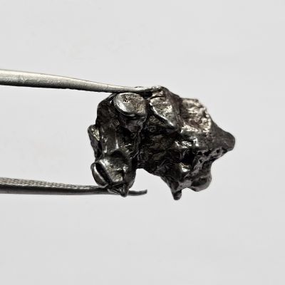 16.77 carats Natural  Meteorite  0.41x0.65x0.72 mm