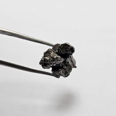 15.24 carats Natural  Meteorite  0.41x0.65x0.72 mm